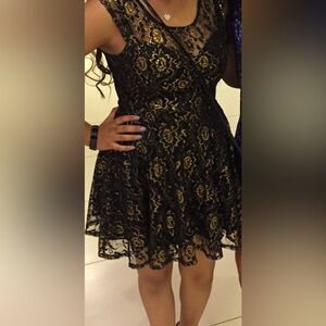 Black and gold lace dress